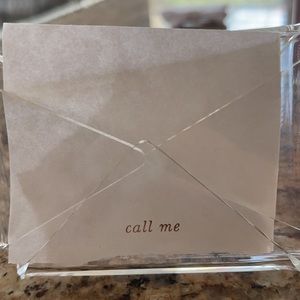 Kate Spade clear business card holder that says call me